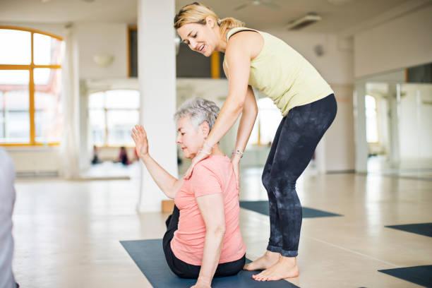 Comment devenir un coach de yoga